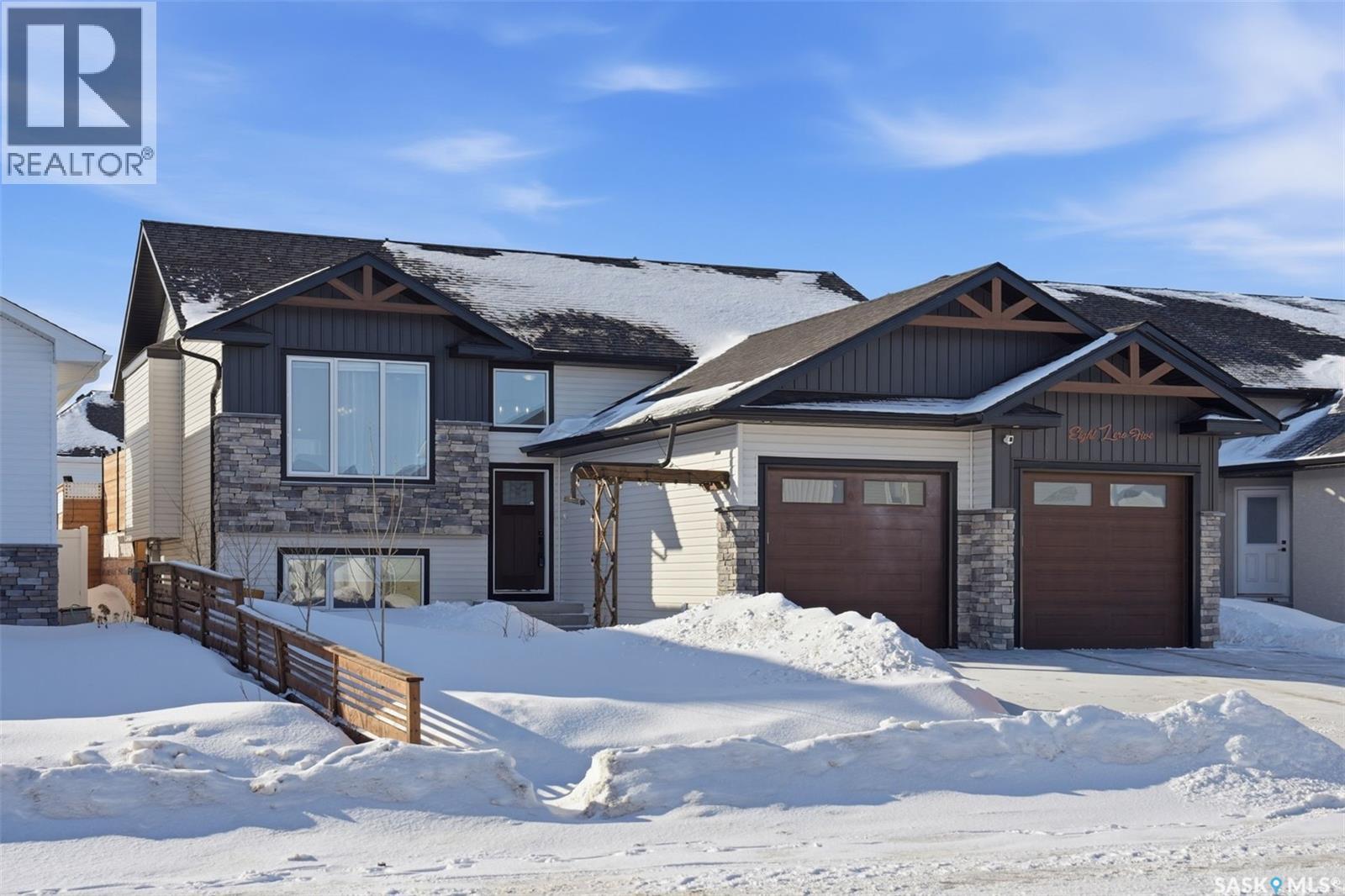 805 Weir Crescent, Warman, SK - Outdoor With Facade