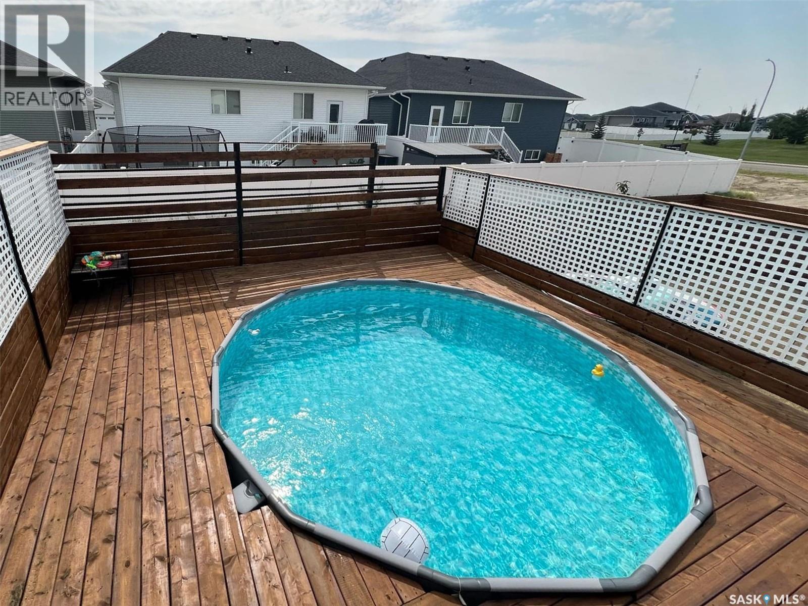 805 Weir Crescent, Warman, SK - Outdoor With Deck Patio Veranda With Exterior