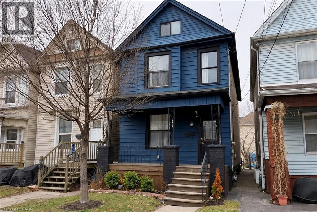 View of front of home with covered porch - 189 Lottridge Street, Hamilton, ON - Outdoor With Facade