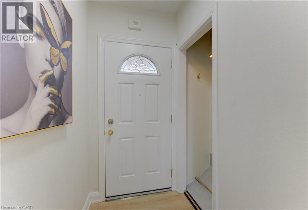 Doorway featuring wood finished floors - 171 Sixth Avenue, Kitchener, ON - Indoor Photo Showing Other Room