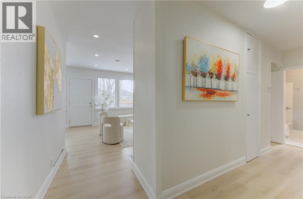 Corridor featuring light wood-style flooring and recessed lighting - 171 Sixth Avenue, Kitchener, ON - Indoor Photo Showing Other Room