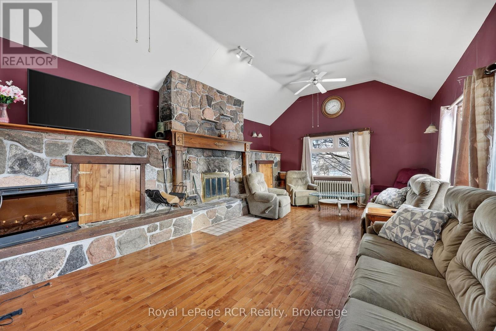 2553 County Road 42, Clearview, ON - Indoor Photo Showing Living Room With Fireplace