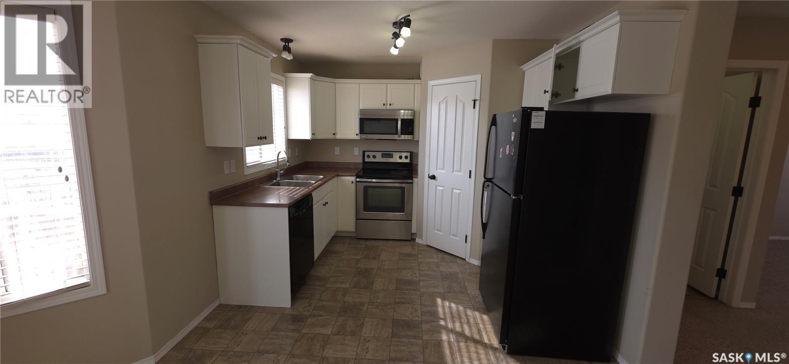 2955 Mcclocklin Road, Saskatoon, SK - Indoor Photo Showing Kitchen With Double Sink