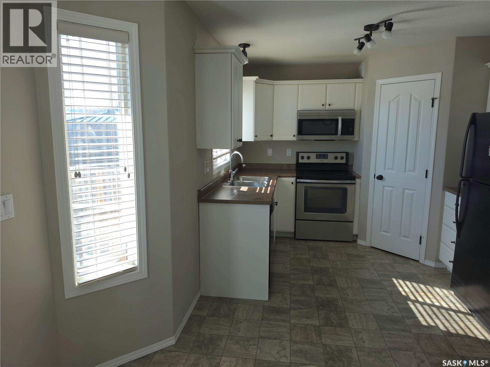 2955 Mcclocklin Road, Saskatoon, SK - Indoor Photo Showing Kitchen With Double Sink