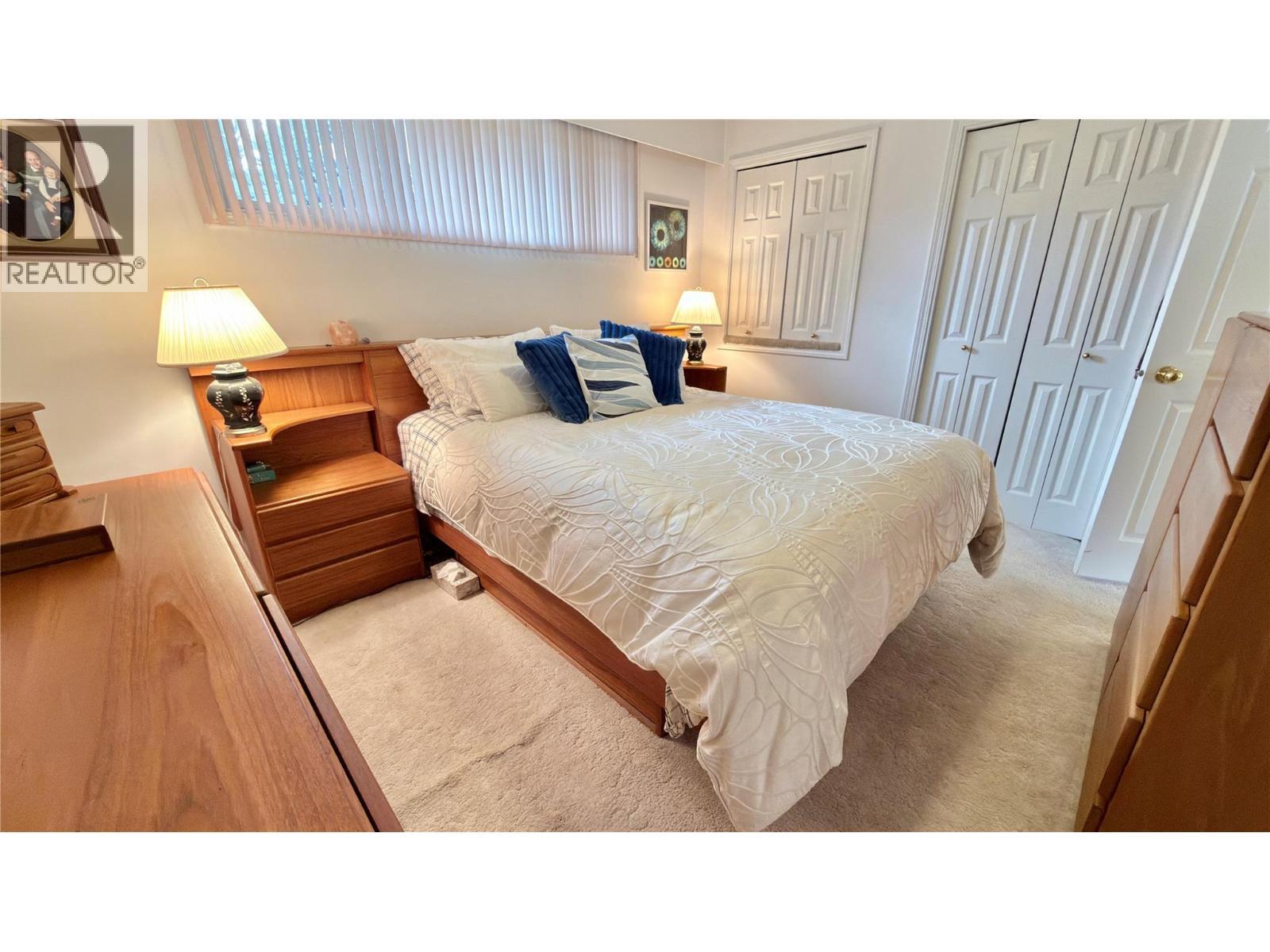 461 Eighth Avenue, Midway, BC - Indoor Photo Showing Bedroom