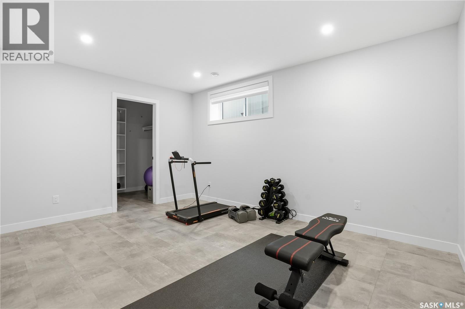 4418 Sage Crescent E, Regina, SK - Indoor Photo Showing Gym Room