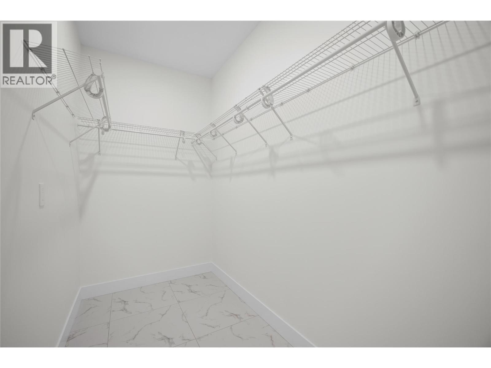 7279 Birch Close, Anglemont, BC - Indoor With Storage