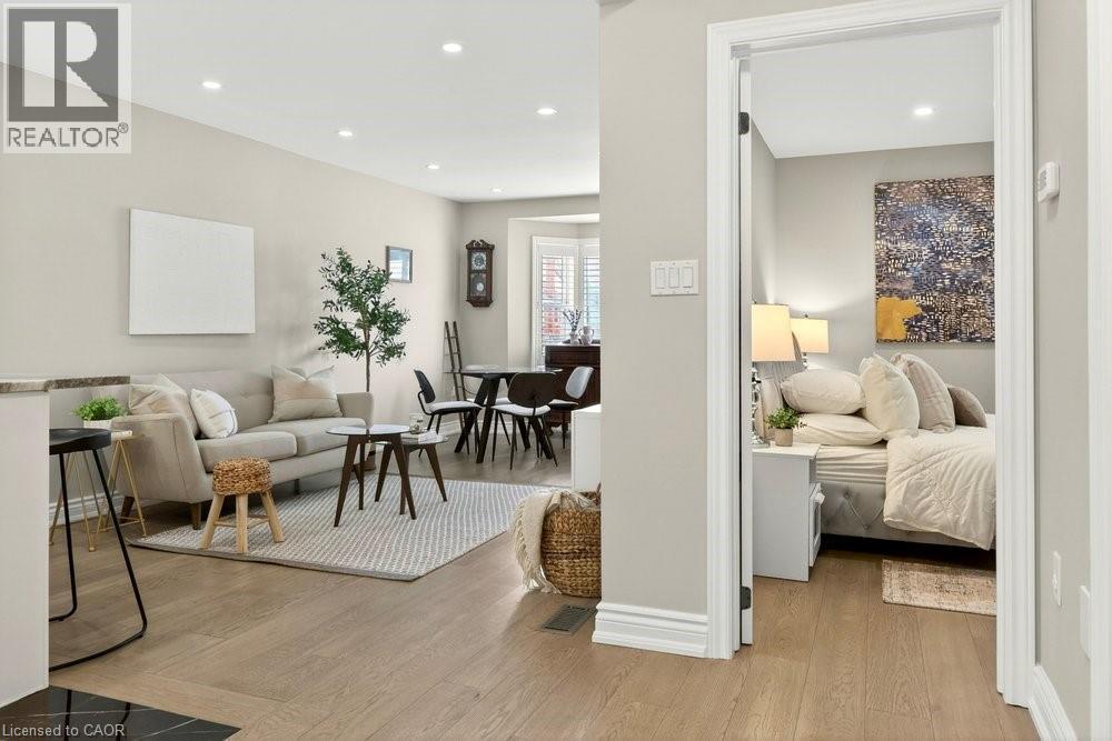 Living room with light wood-type flooring and recessed lighting - 237 East 32Nd Street, Hamilton, ON - Indoor