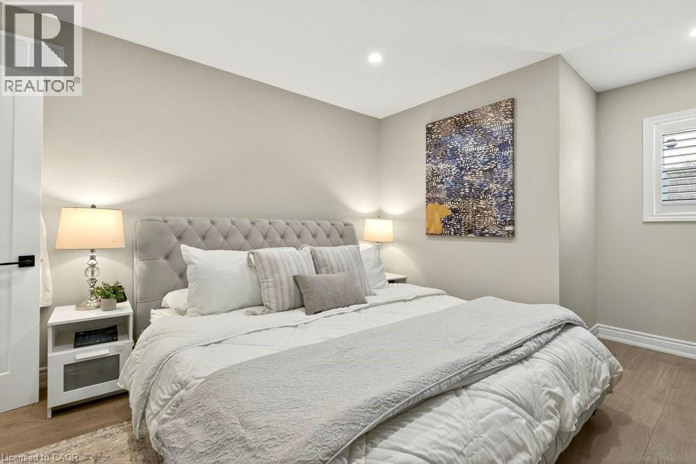 Bedroom with wood finished floors and recessed lighting - 237 East 32Nd Street, Hamilton, ON - Indoor Photo Showing Bedroom