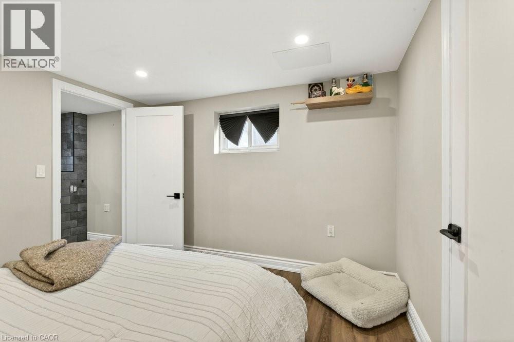 Bedroom featuring wood finished floors and recessed lighting - 237 East 32Nd Street, Hamilton, ON - Indoor Photo Showing Bedroom
