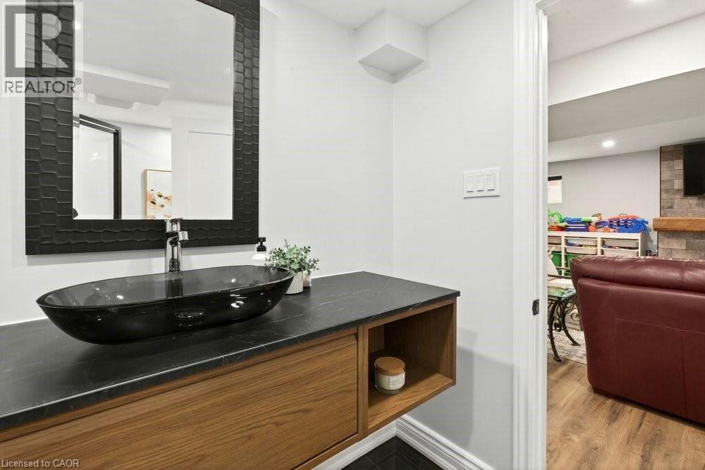 Bathroom with vanity, light wood-style floors, and recessed lighting - 237 East 32Nd Street, Hamilton, ON - Indoor