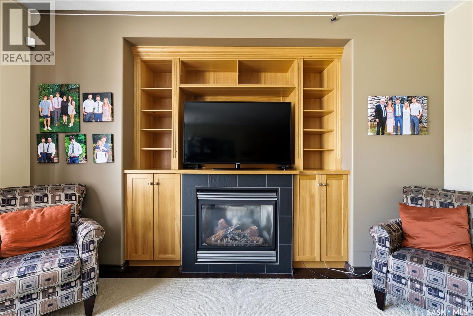 2451 Linner Bay, Regina, SK - Indoor With Fireplace