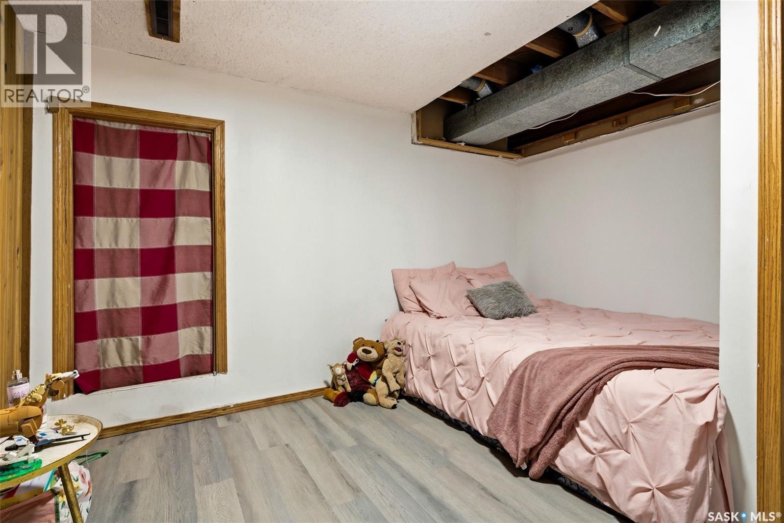 18 Marsh Crescent, Regina, SK - Indoor Photo Showing Bedroom