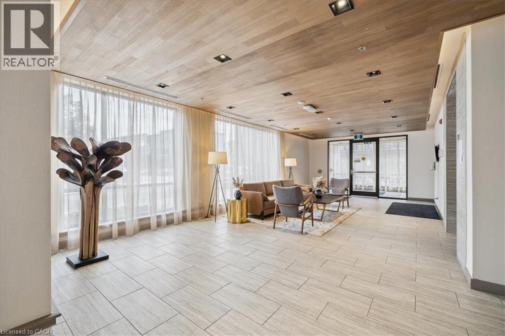 Building lobby featuring wood ceiling - 40 Esplanade Lane Unit# 102, Grimsby, ON - Indoor Photo Showing Other Room