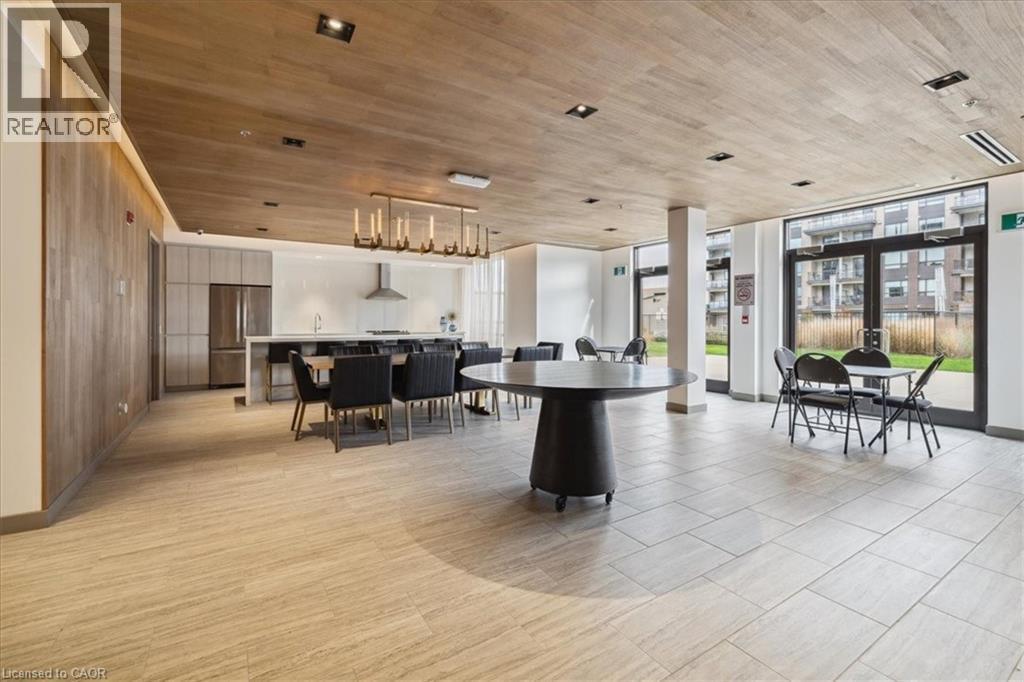 Community lobby featuring wood ceiling - 40 Esplanade Lane Unit# 102, Grimsby, ON - Indoor