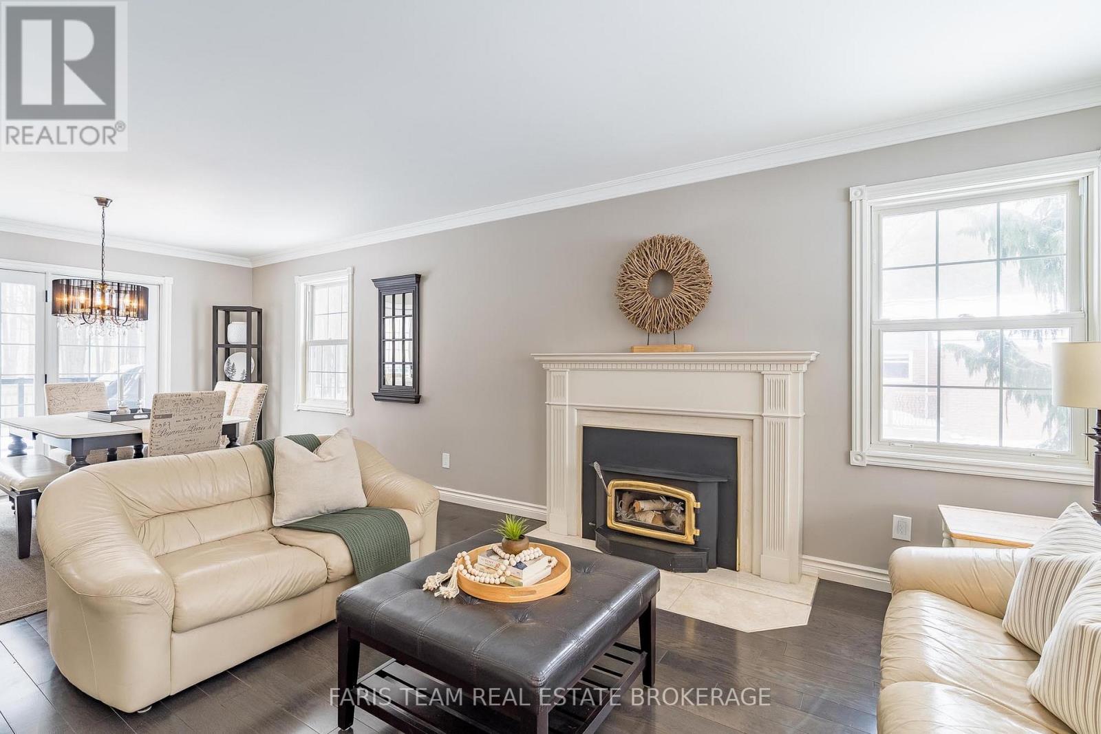 5 Bailey Crescent, Tiny, ON - Indoor Photo Showing Living Room With Fireplace