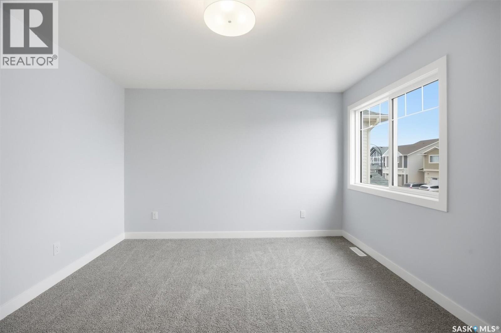 262 Kostiuk Crescent, Saskatoon, SK - Indoor Photo Showing Other Room