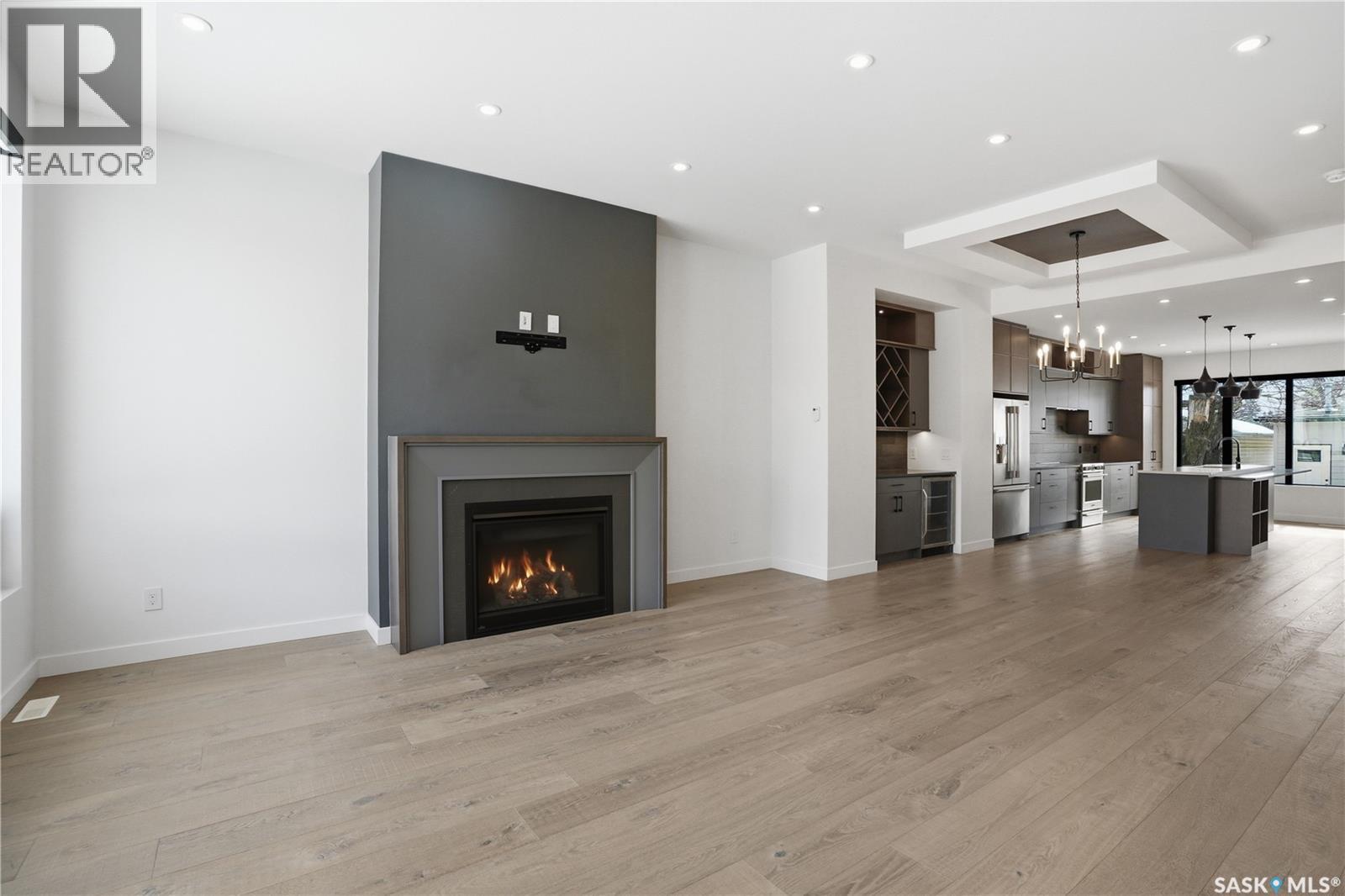 1312 15Th Street E, Saskatoon, SK - Indoor Photo Showing Living Room With Fireplace
