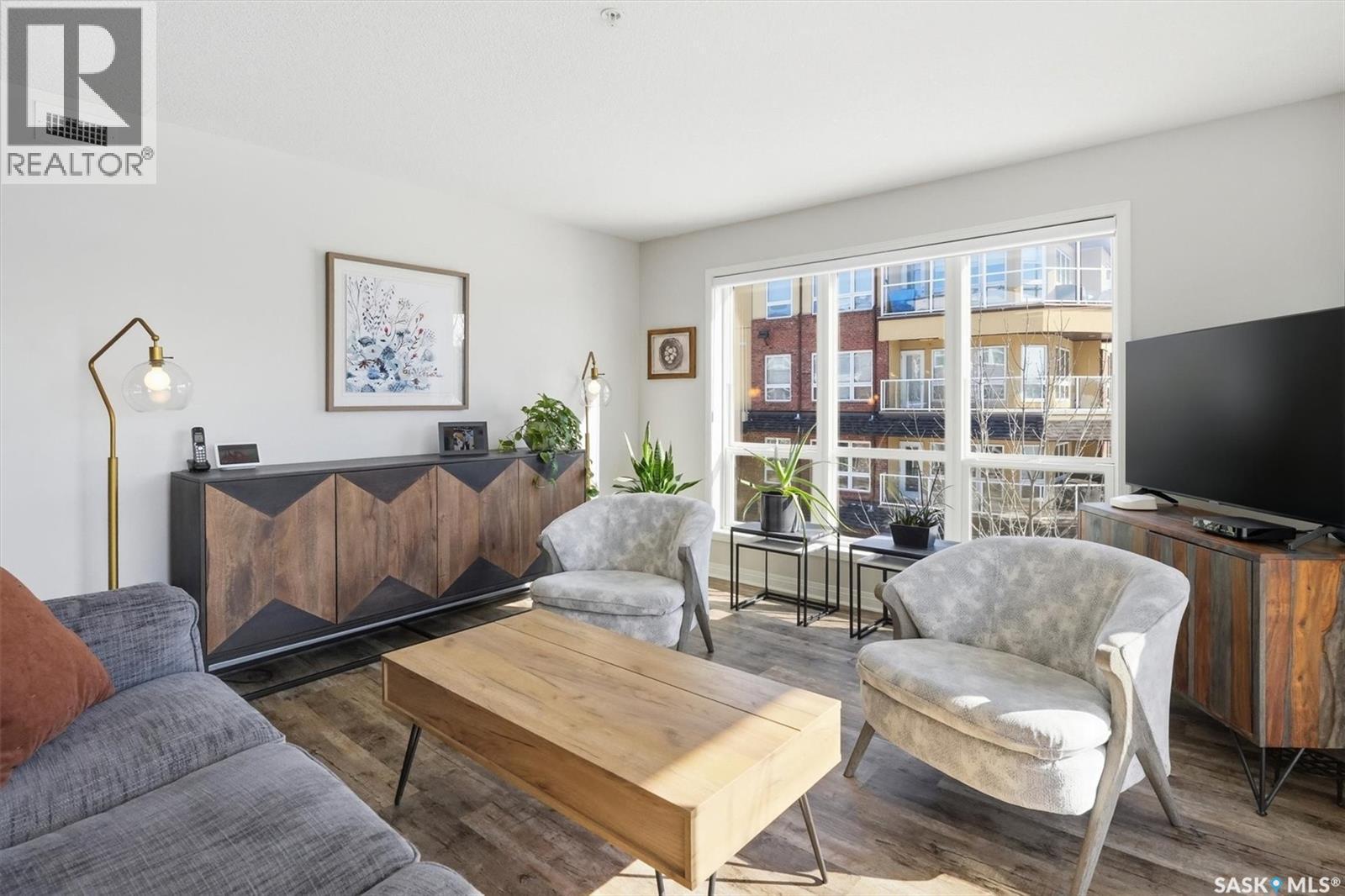 203 914 Heritage View, Saskatoon, SK - Indoor Photo Showing Living Room