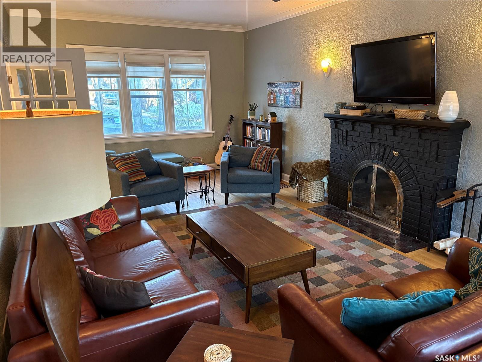 2620 Angus Boulevard, Regina, SK - Indoor Photo Showing Living Room With Fireplace