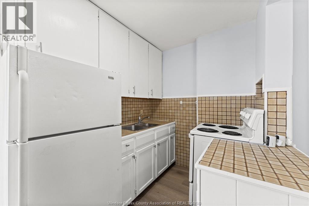 1107 Pierre, Windsor, ON - Indoor Photo Showing Kitchen With Double Sink