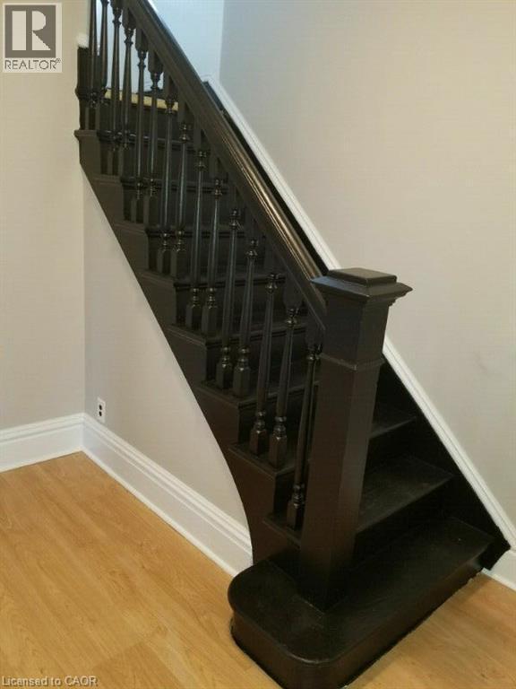 Stairway featuring wood finished floors - 170 Stewartdale Avenue, Hamilton, ON - Indoor Photo Showing Other Room