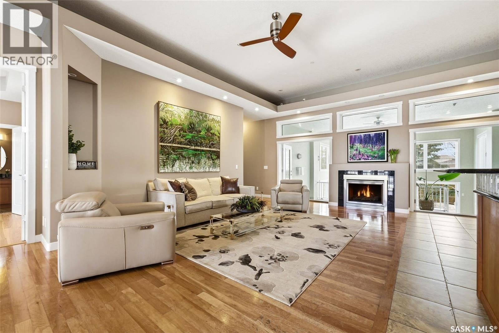 3270 Windsor Park Crescent, Regina, SK - Indoor Photo Showing Living Room With Fireplace
