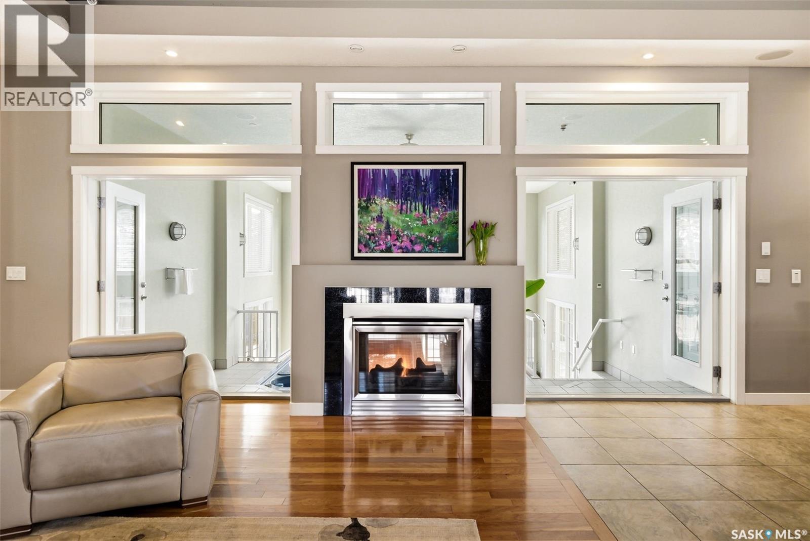 3270 Windsor Park Crescent, Regina, SK - Indoor Photo Showing Living Room With Fireplace