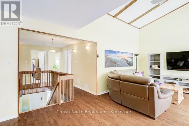 Upstairs living area with stairs and seating - 39 Turtle Path, Ramara, ON - Indoor
