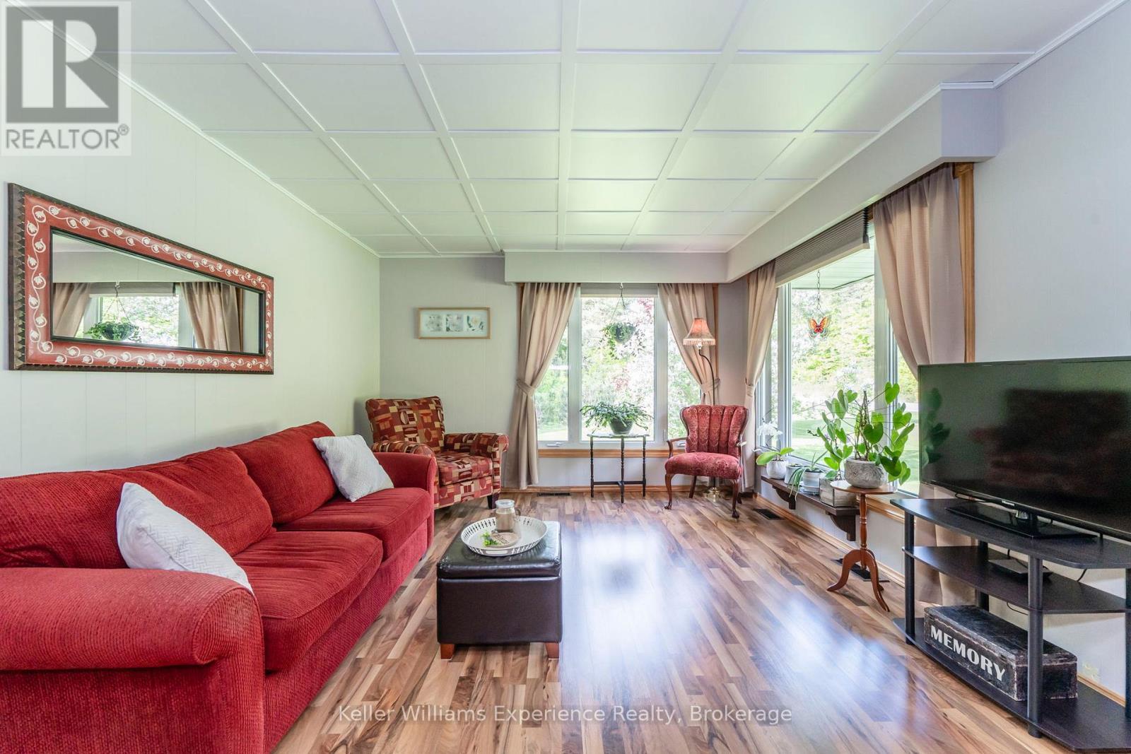 450 Concession 11 Road E, Tiny, ON - Indoor Photo Showing Living Room