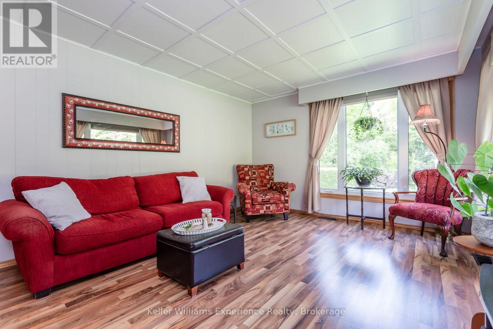 450 Concession 11 Road E, Tiny, ON - Indoor Photo Showing Living Room