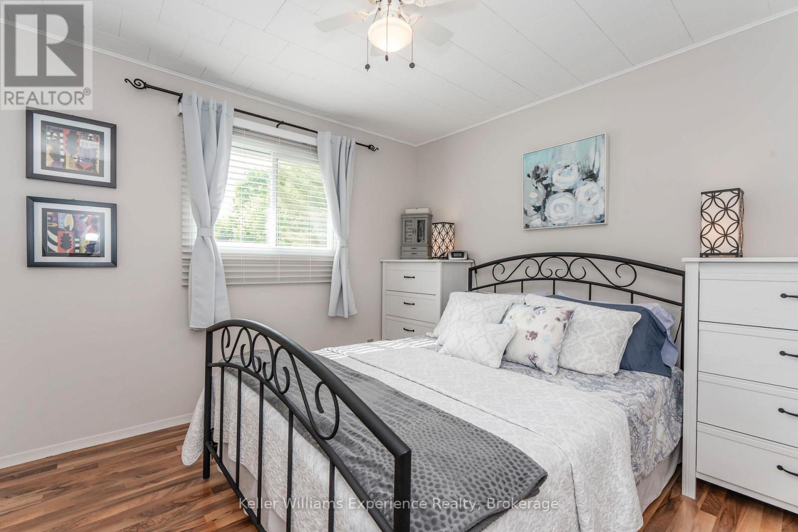 450 Concession 11 Road E, Tiny, ON - Indoor Photo Showing Bedroom