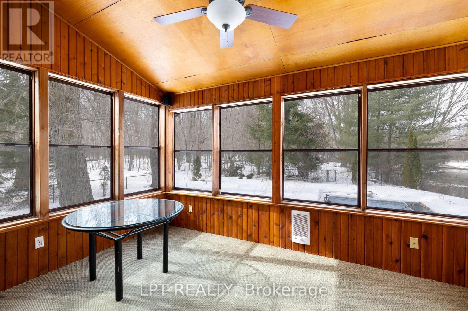 Sunroom Overlooking Property - 50 Concession Rd 2 W, Tiny, ON - Indoor Photo Showing Other Room