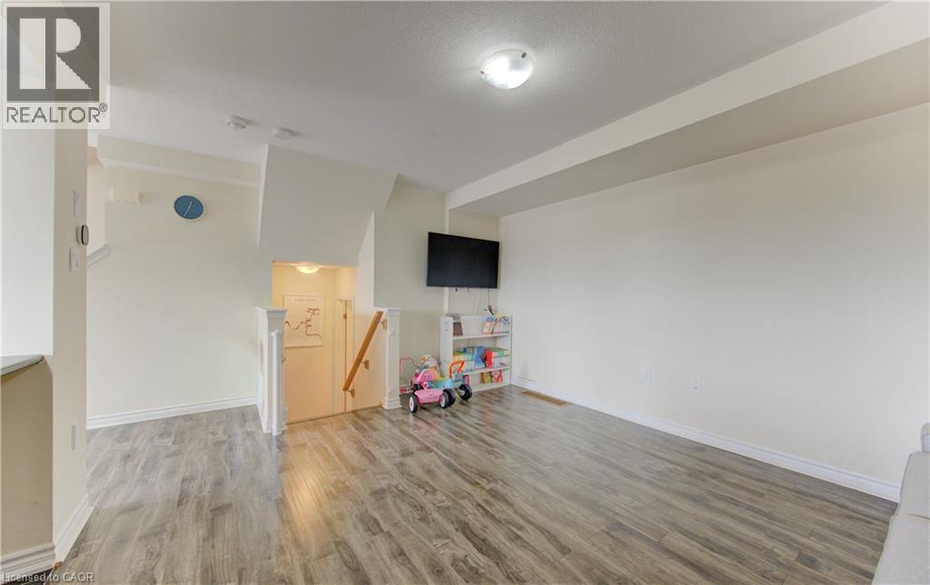 Rec room featuring light wood finished floors and baseboards - 9 Outlook Terrace, Kitchener, ON - Indoor Photo Showing Other Room