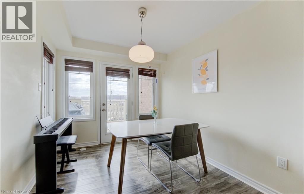 Dining area featuring wood finished floors and baseboards - 9 Outlook Terrace, Kitchener, ON - Indoor Photo Showing Dining Room