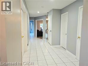 Corridor featuring light tile patterned floors and recessed lighting - 486 Dicenzo Drive, Hamilton, ON - Indoor Photo Showing Other Room