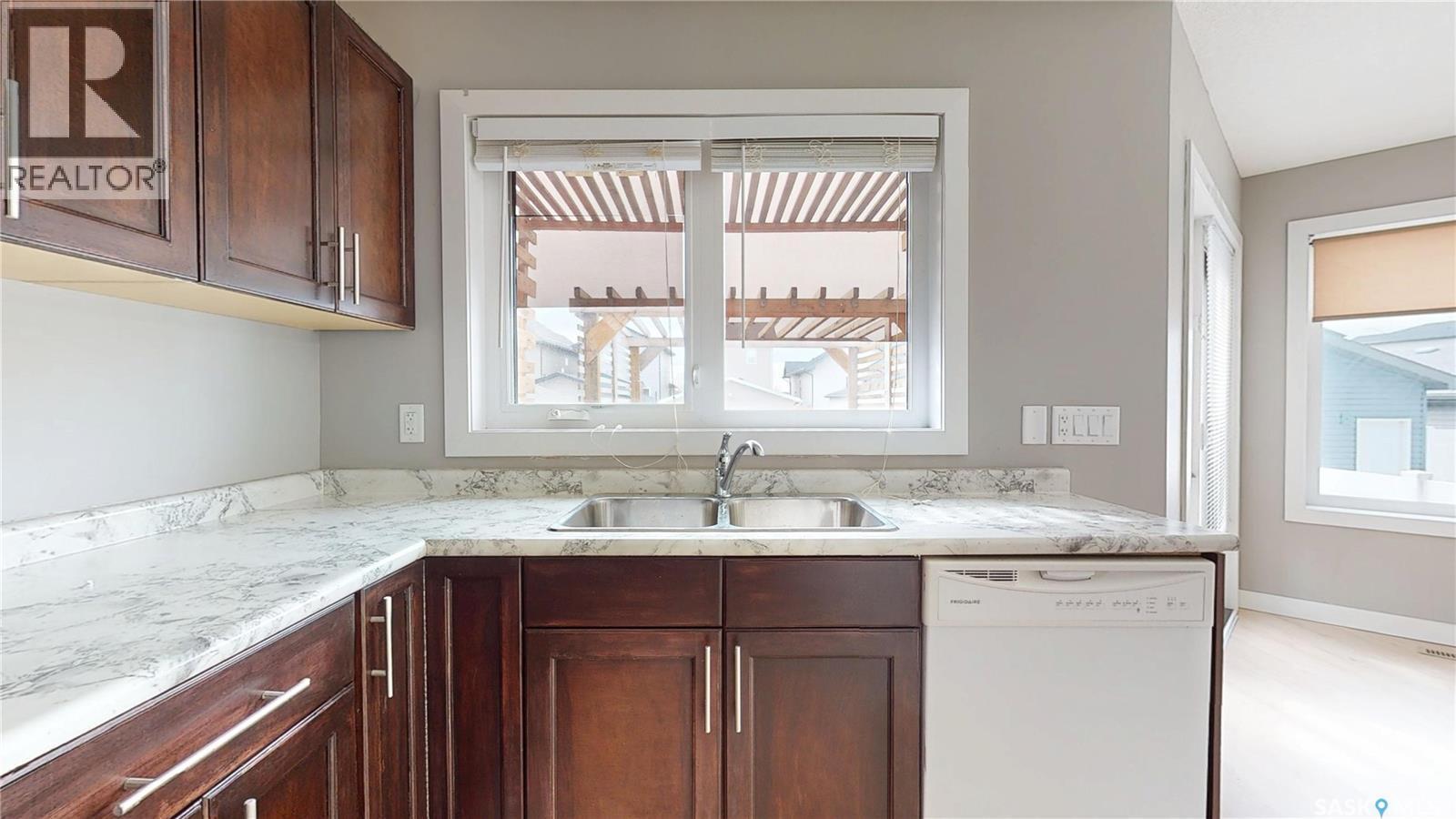 5128 Aerial Crescent, Regina, SK - Indoor Photo Showing Kitchen With Double Sink