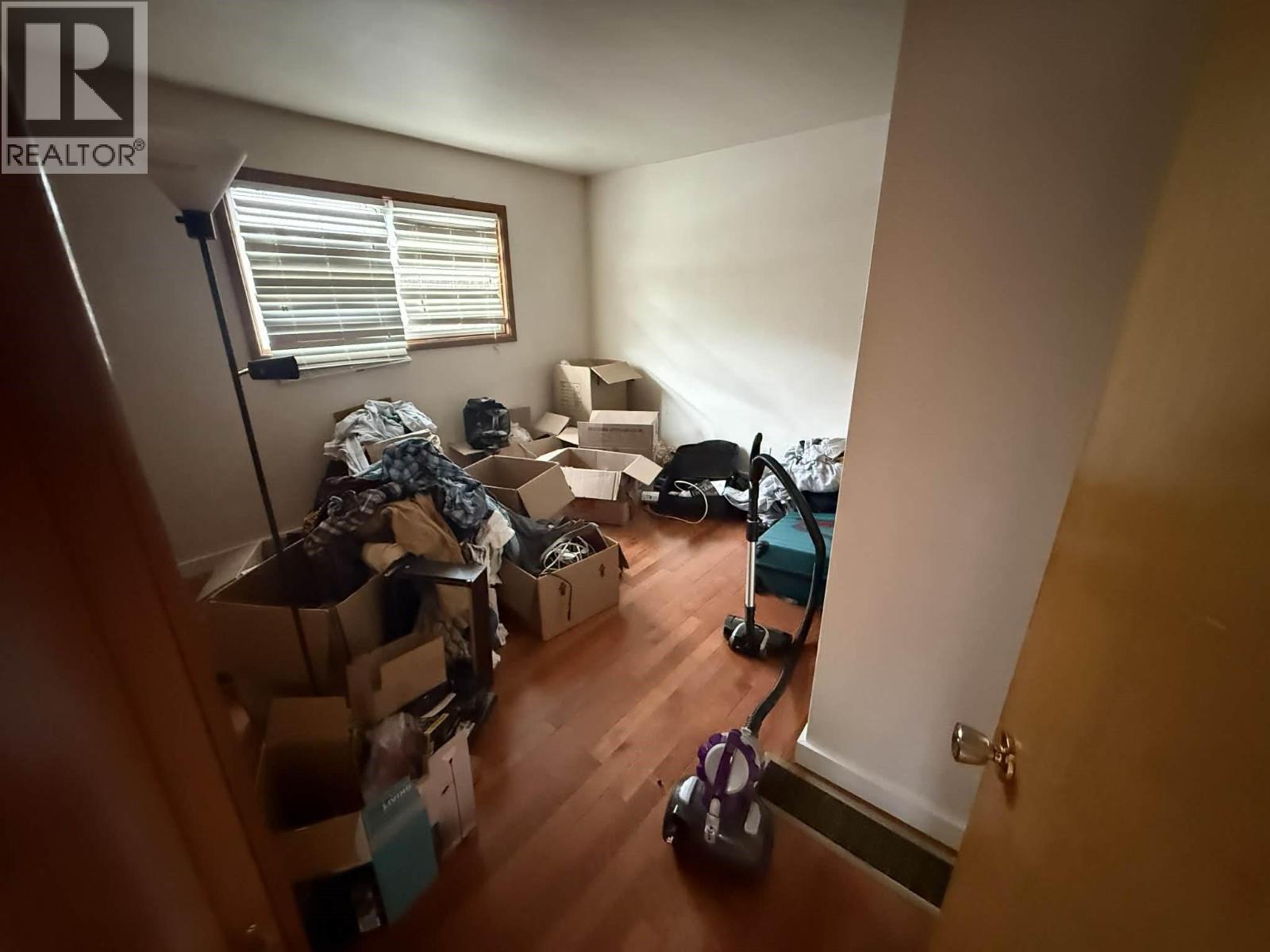 Bedroom 1 of 2 in suite. - 1503 3A Highway, Castlegar, BC