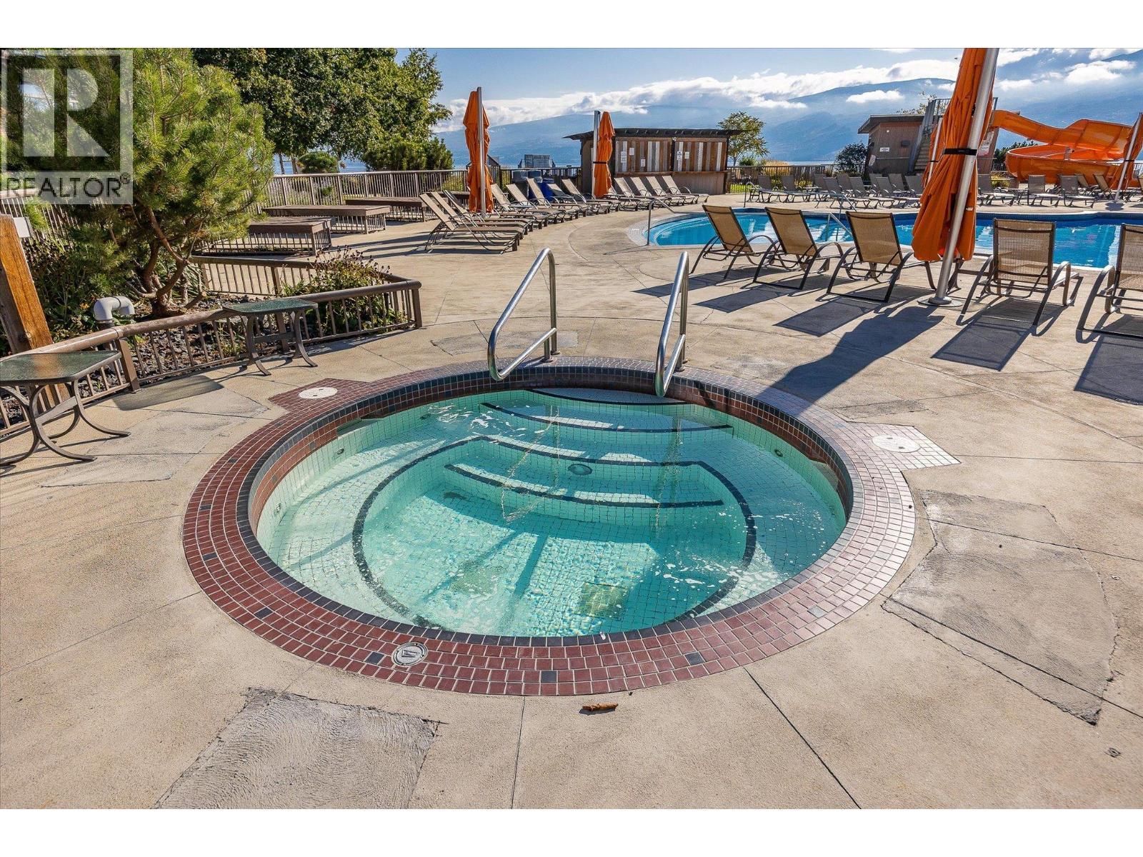 4205 Gellatly Road Unit# 305, West Kelowna, BC - Outdoor With In Ground Pool