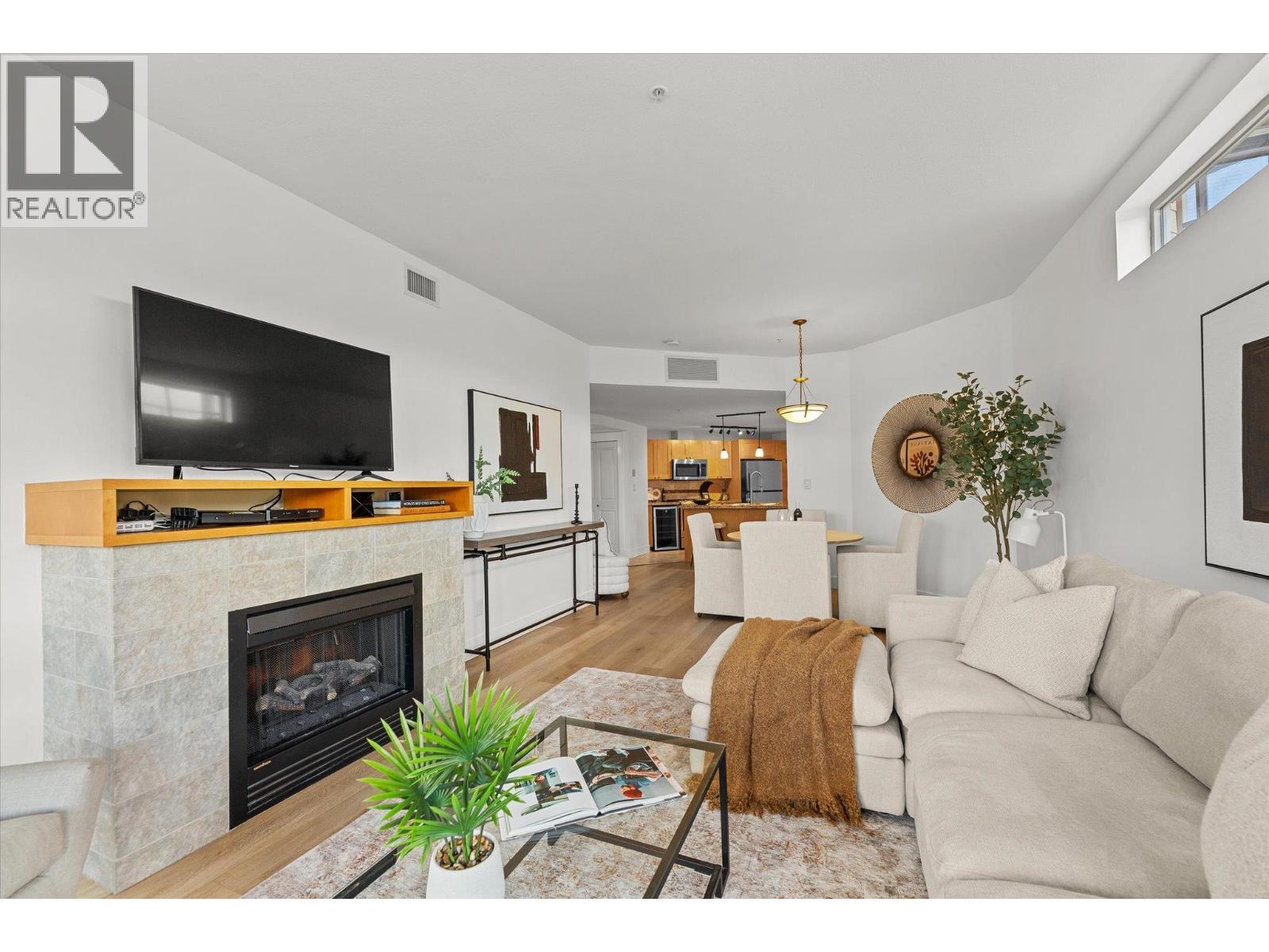 4205 Gellatly Road Unit# 305, West Kelowna, BC - Indoor Photo Showing Living Room With Fireplace