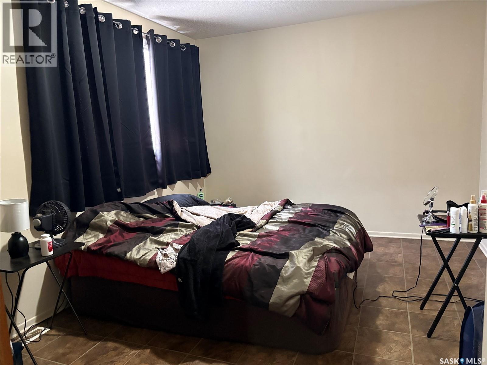 43 Bantry Street, Lanigan, SK - Indoor Photo Showing Bedroom