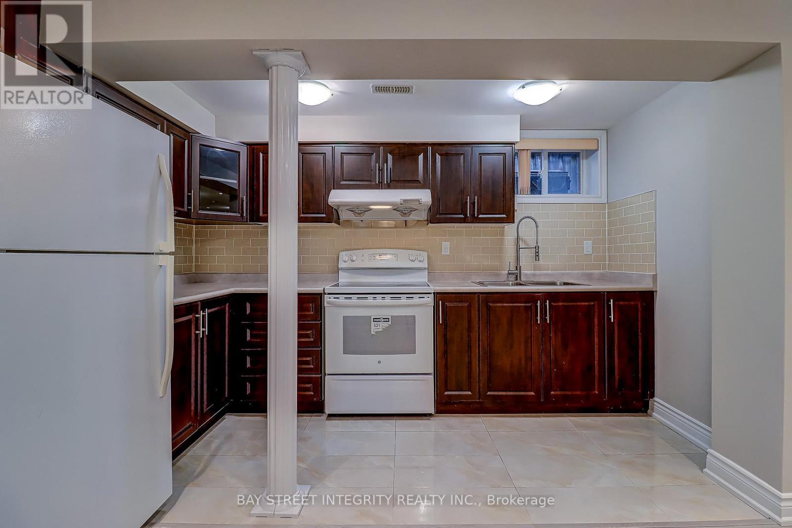 Basement Kitchen - 12 Combermere Drive, Toronto, ON - Indoor Photo Showing Kitchen With Double Sink