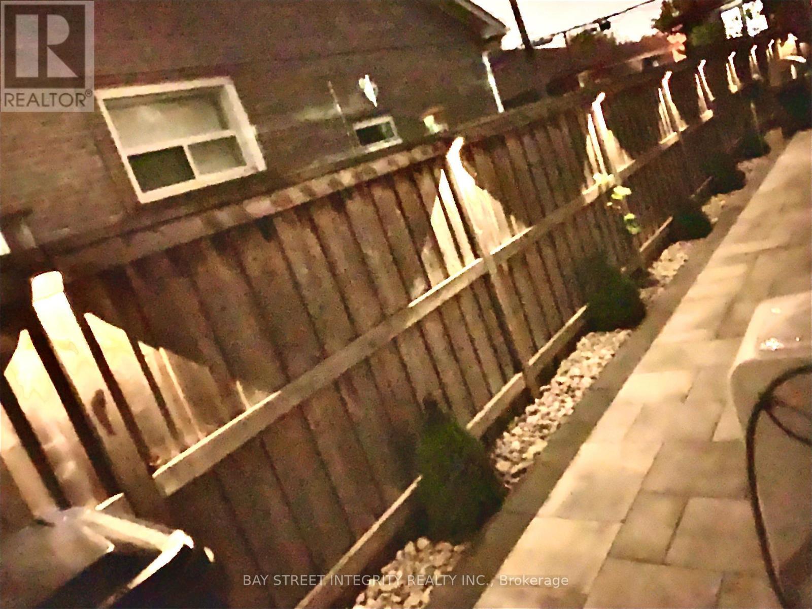 Side Yard - 12 Combermere Drive, Toronto, ON - Photo Showing Other Room