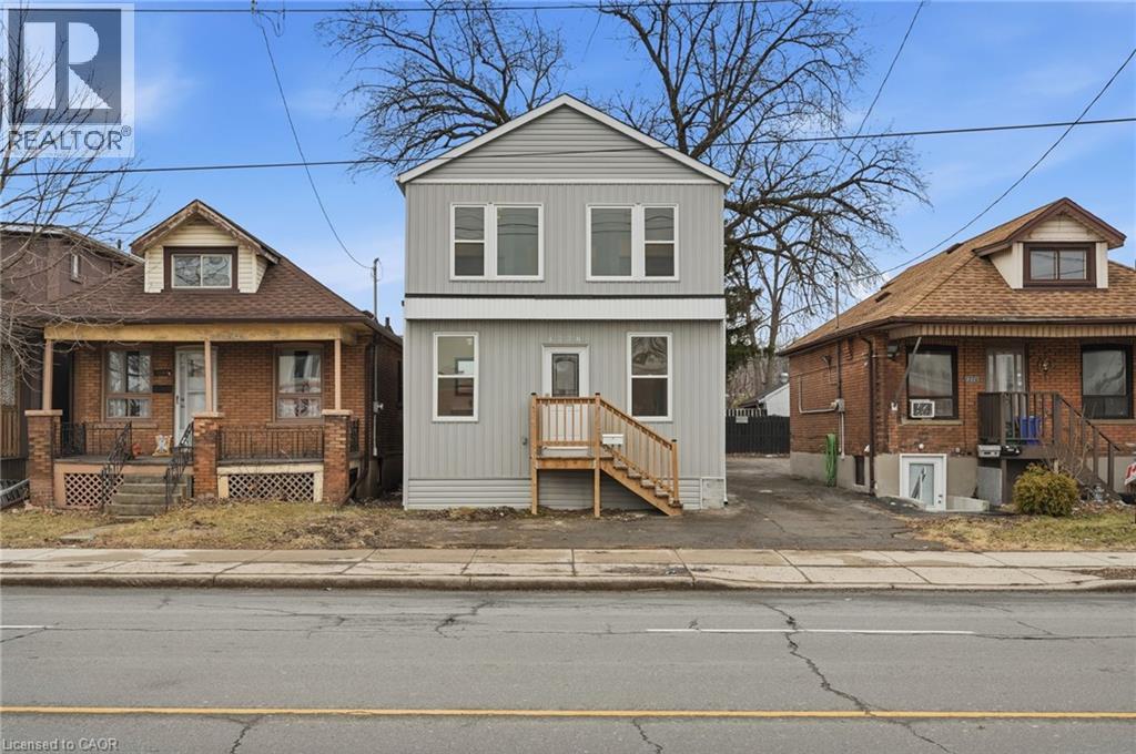 View of front facade featuring a porch - 1278 Main Street E, Hamilton, ON - Outdoor With Facade