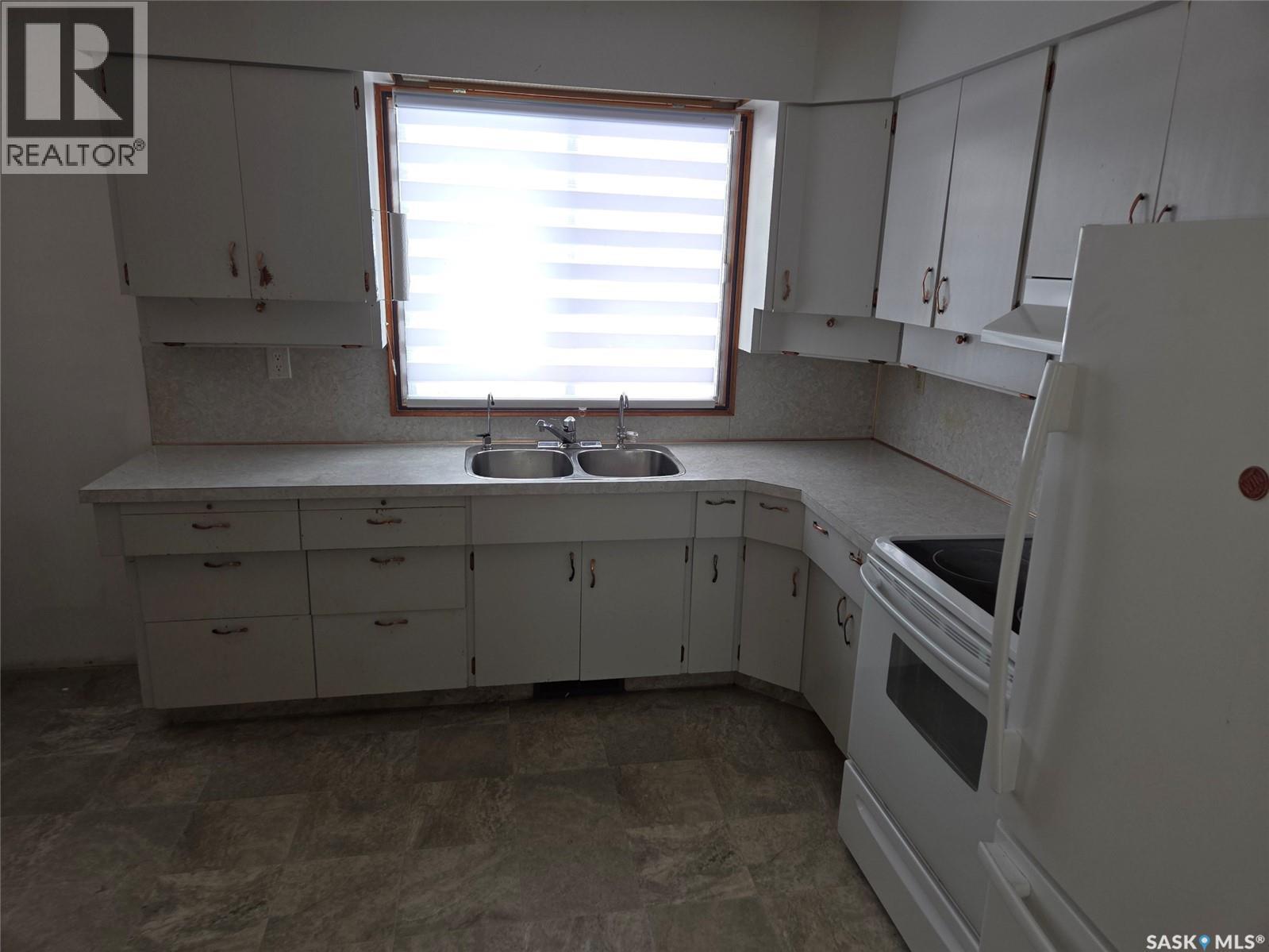 643 Main Street, Annaheim, SK - Indoor Photo Showing Kitchen With Double Sink