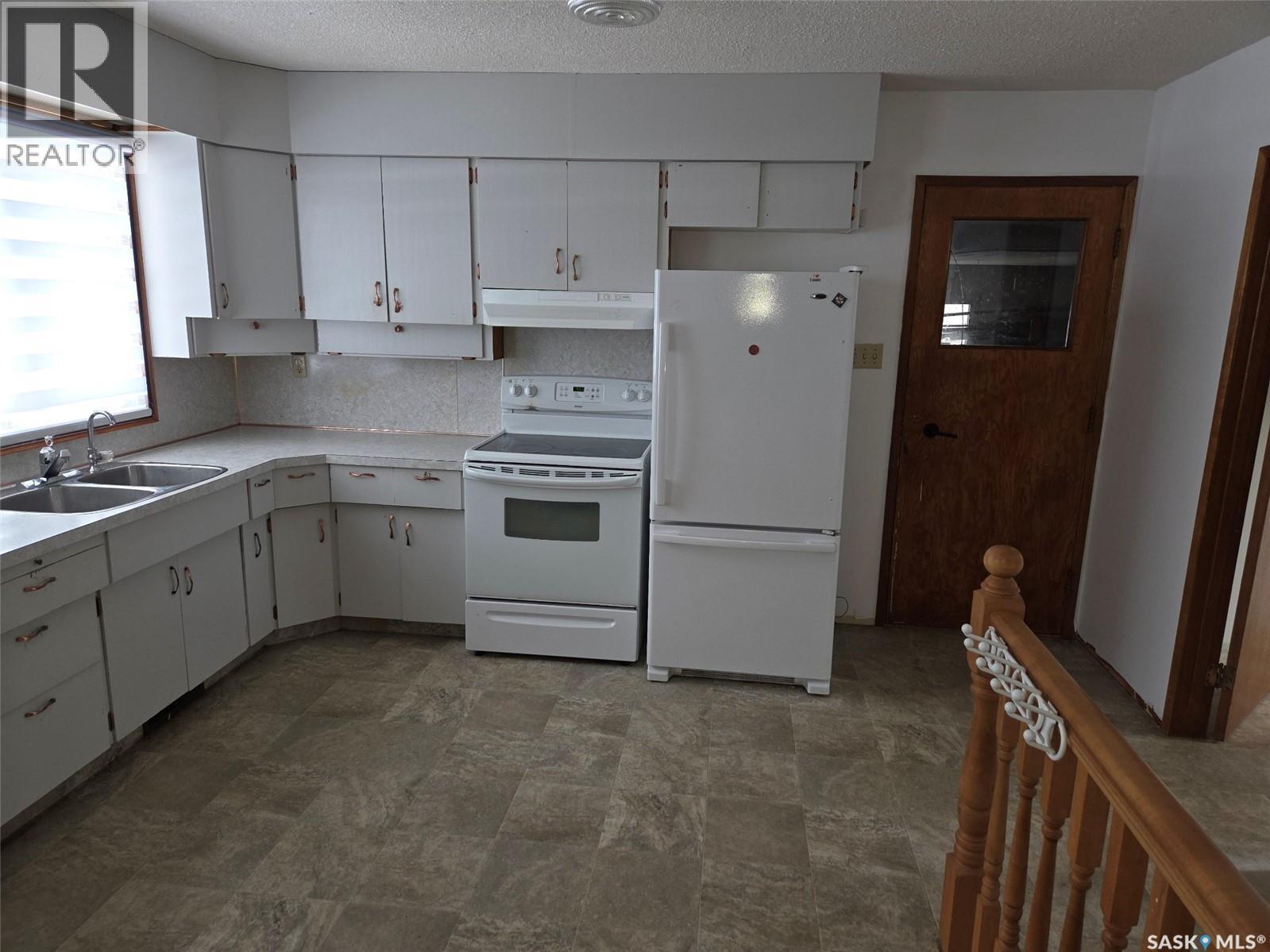 643 Main Street, Annaheim, SK - Indoor Photo Showing Kitchen With Double Sink