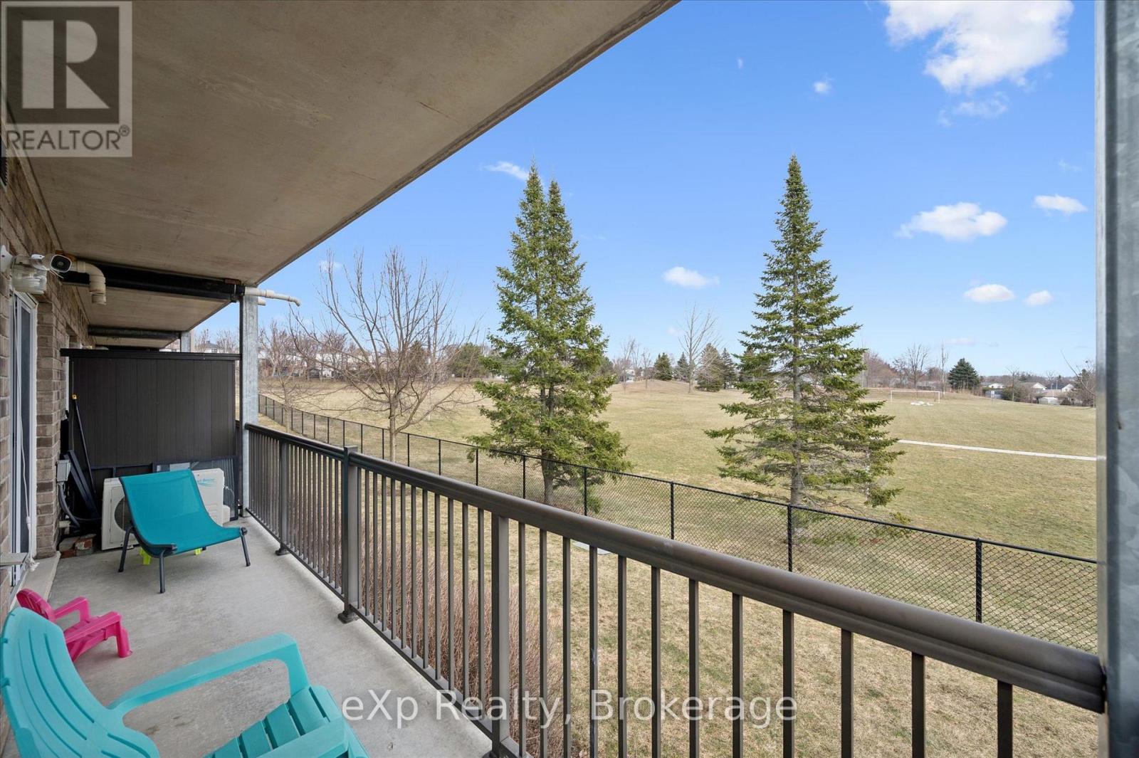 View of Park from back balcony - 87 - 35 Mountford Drive, Guelph (Grange Road), ON - Outdoor With Balcony With Exterior