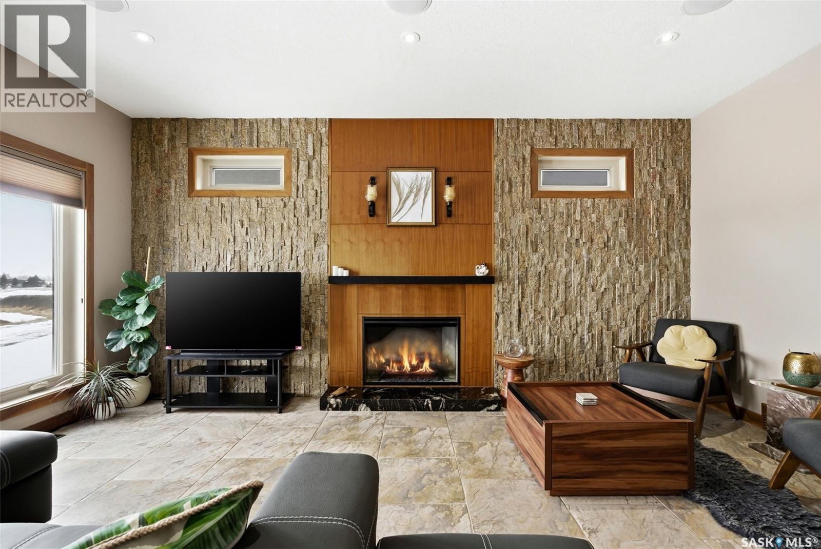 7502 Lilac Place, Regina, SK - Indoor Photo Showing Living Room With Fireplace