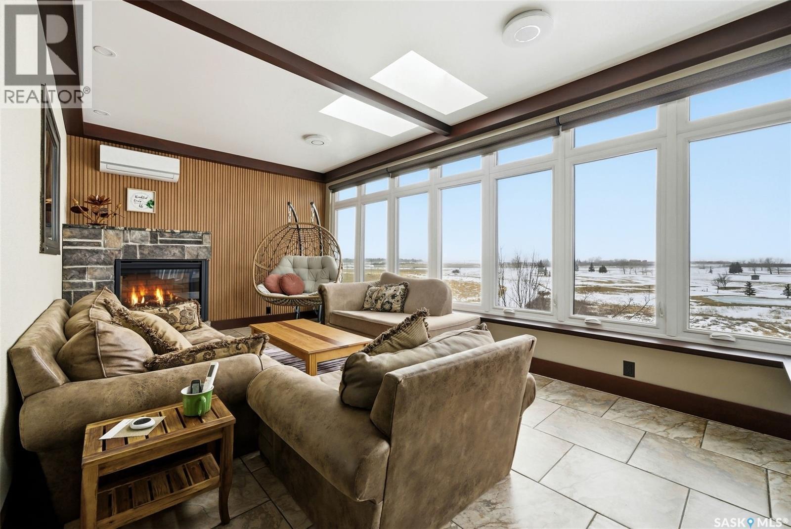 7502 Lilac Place, Regina, SK - Indoor Photo Showing Living Room With Fireplace