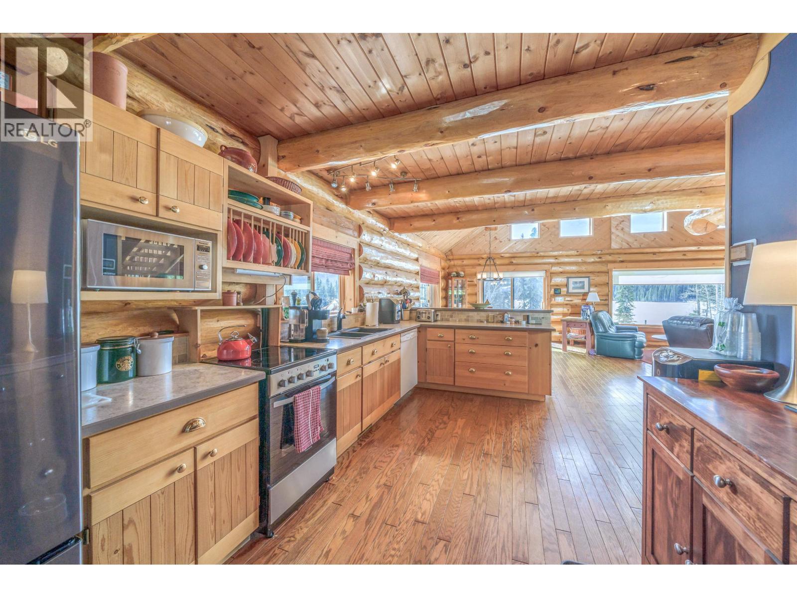 7540 Mccarthy Road, Bridge Lake, BC - Indoor Photo Showing Kitchen With Double Sink